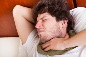 After a night of heavy drinking, you'll probably start to feel the effects of a hangover, including a sore throat, stomach pain, and nausea.