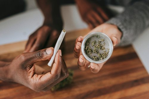 marijuana joint and grinder