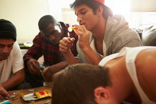 group of teenage boys doing meth at a party