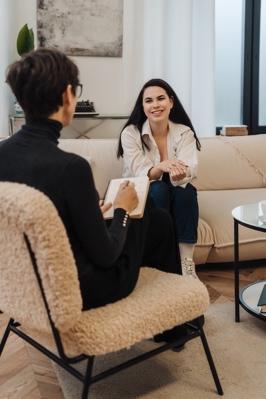 A person participates in therapy at a drug rehab center.