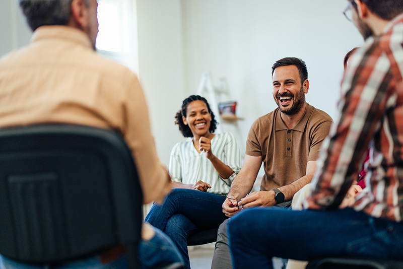 People participate in therapy as part of a bipolar disorder treatment program.