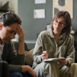 A woman participates in trauma therapy.