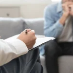 A man participates in outpatient therapy for depression.