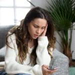 A person uses social media.