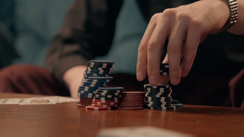 A person struggles with gambling addiction.