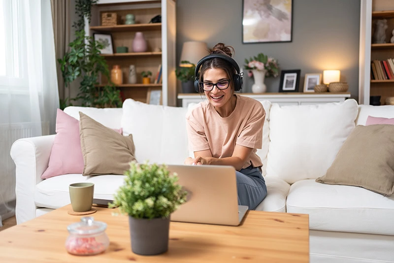 A woman participates in virtual addiction treatment services.