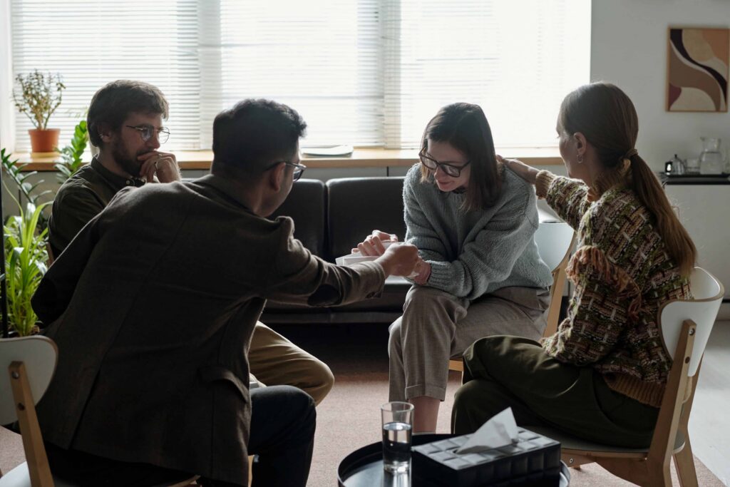 Group of people in a drug rehab ipswich.