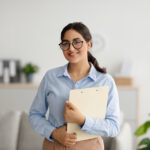 Woman therapist ready for you to start trauma therapy in boston.