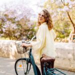 Woman biking after finding out how to have fun in recovery.