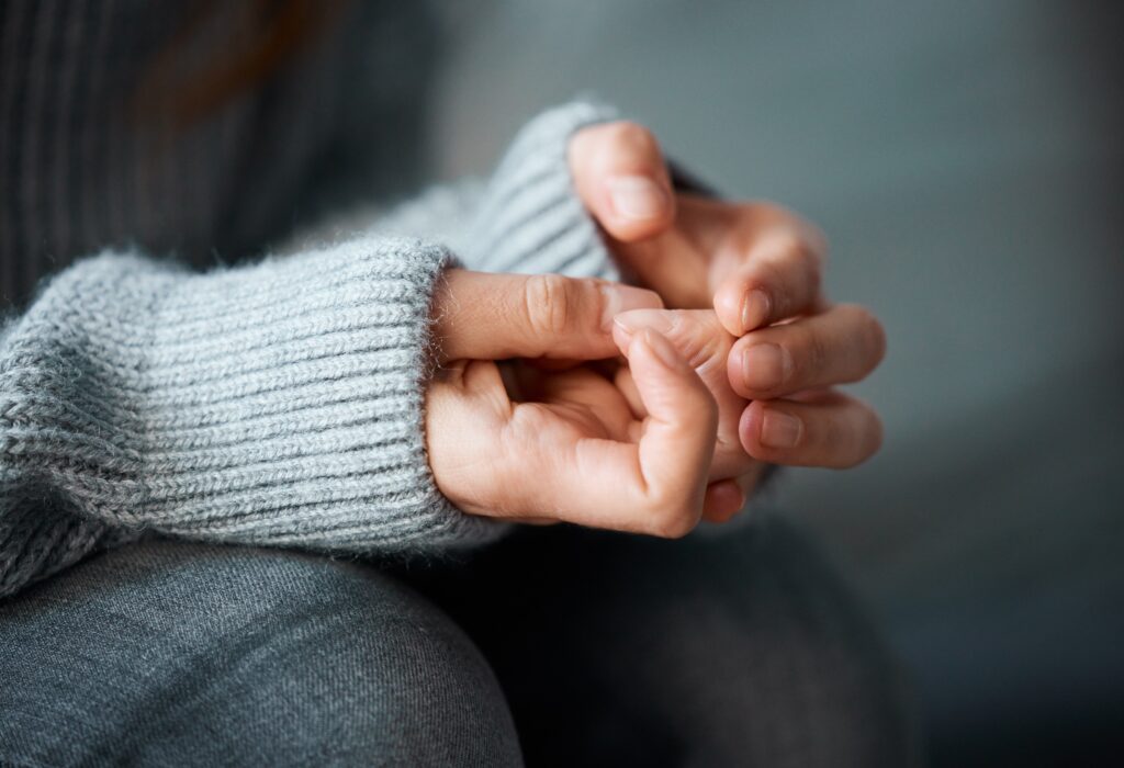 Nervous woman holding her hands at springfield ma drug rehab.